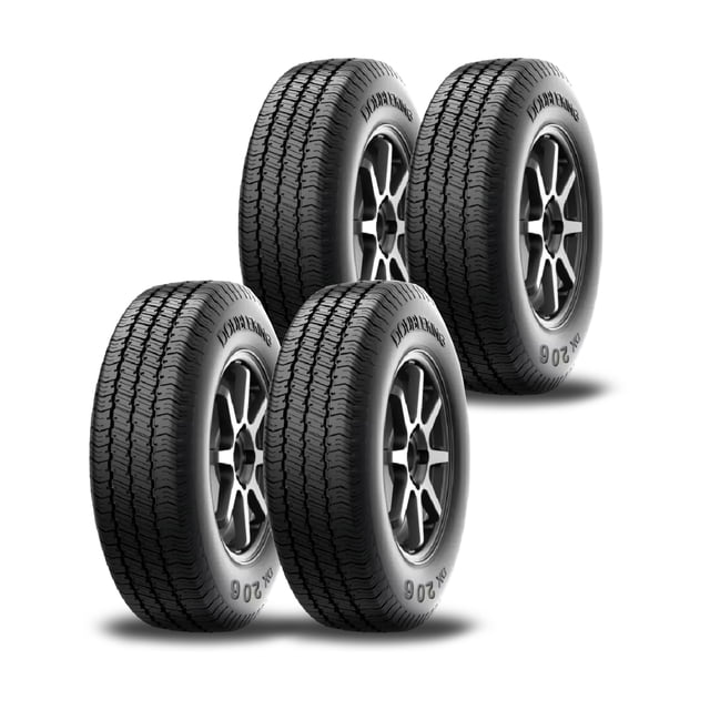paquete 4 llantas doubleking dk558 215 60 r16 95v paquete de cuatro llantas negras 215/60 R16 95V con dibujo simétrico, cuatro surcos circunferenciales anchos, microsurcos y costilla central; vista 3/4 frontal con rines montados sobre fondo blanco, diseño para todo tipo de clima y opción frecuente para reemplazo de juego completo.