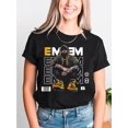 thumbnail image 1 of [Bold Style] Emem Rapper Women's Graphic Print Casual T-Shirt - Soft Breathable Stretch Fabric, Round Neck, Summer Streetwear Style, Black with Bold Urban Design, Machine Washable, 1 of 6