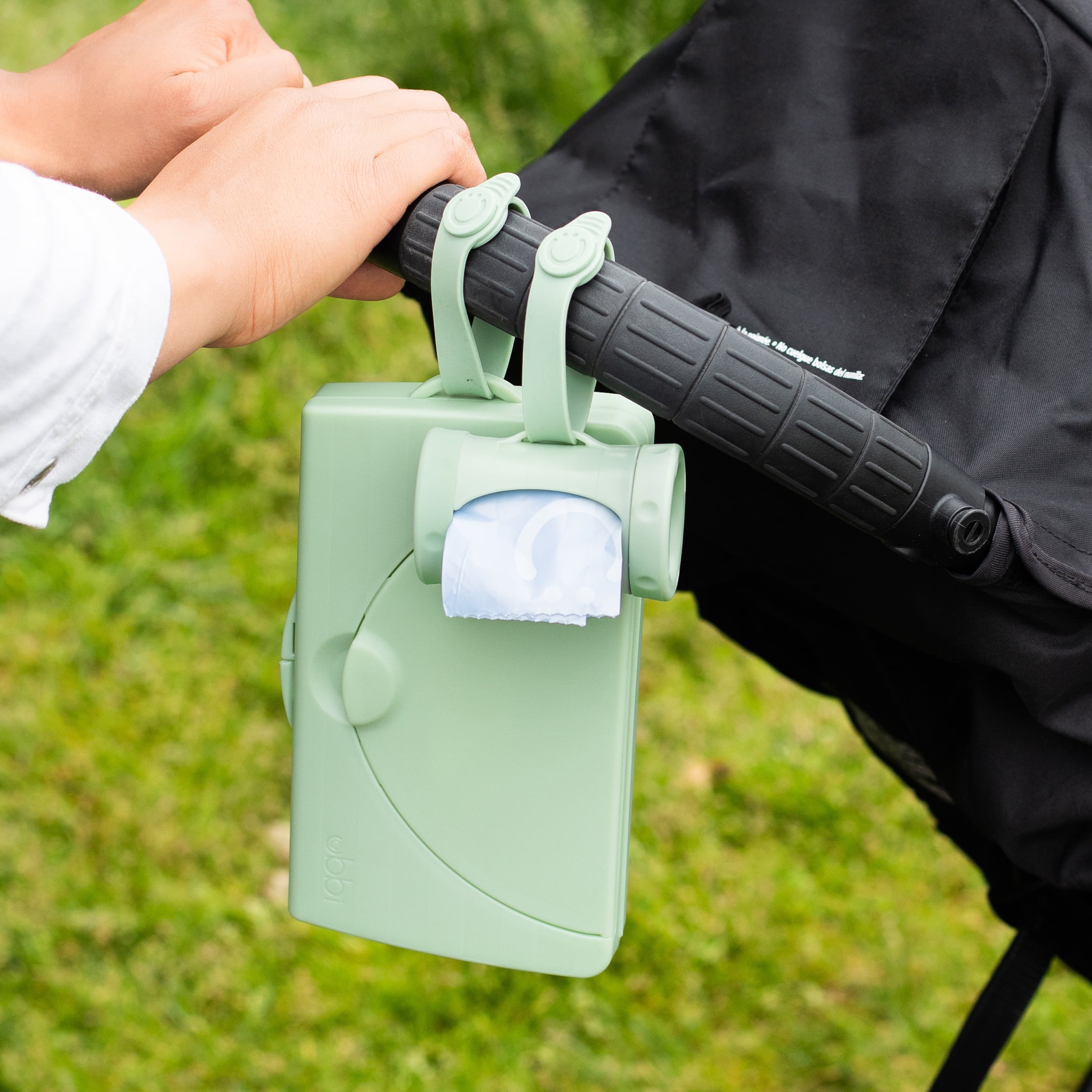 Ubbi On-The-Go Retractable Diaper Disposal Bag Dispenser for Travel, Newborn Must-Have, Sage Green