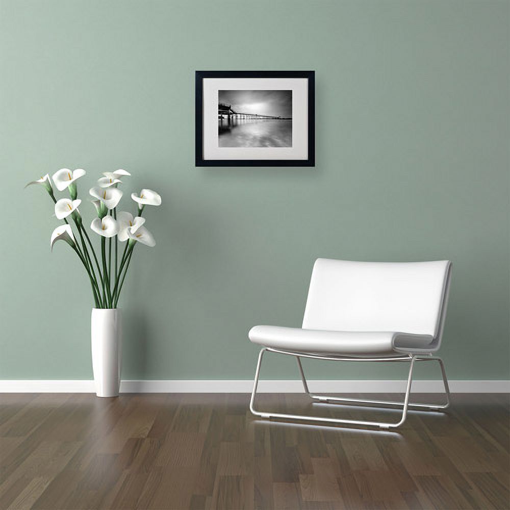 Matted art under acrylic in a black frame