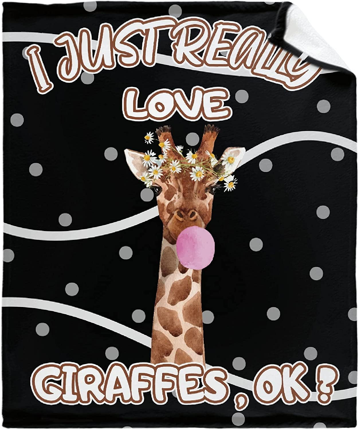 Blankets and top beyond giraffe