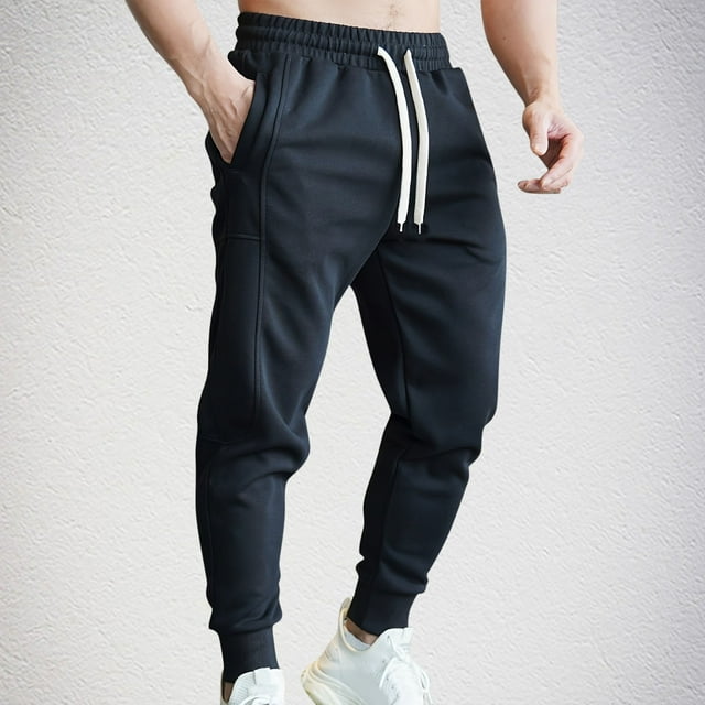 Pantalones largos de poliéster para hombre, de moda, de color liso, cálidos, para otoño e invierno, para fitness, informales y de trabajo.