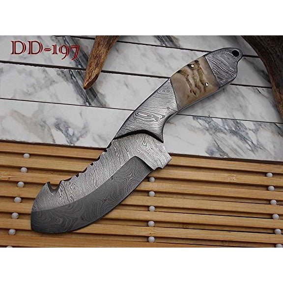 9 Inches long Damascus steel skinning knife, 4.5" twist pattern Modified trailing point blade, Natural Ram horn scale with steel bolster, cow hide leather sheath included