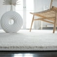 thumbnail image 3 of SAFAVIEH Plain and Solid Carleen Solid Plush Area Rug, Ivory, 5'5" x 7'7", 3 of 8