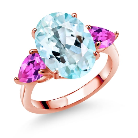 Gem Stone King 18K Rose Gold Plated Silver Sky Blue Topaz and Pink Created Sapphire Ring for Women (8.18 Cttw, 14X10MM Oval and 7X5MM Pear Shape, Gemstone November Birthstone, Size 5)