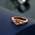 thumbnail image 4 of 18K Rose Gold Plated Silver Ecstasy Mystic Topaz and White Lab Grown Diamond 3 Stone Engagement Ring for Women | 1.58 Cttw | Oval 8X6MM | Round 2MM | Gemstone November Birthstone | Size 9, 4 of 4