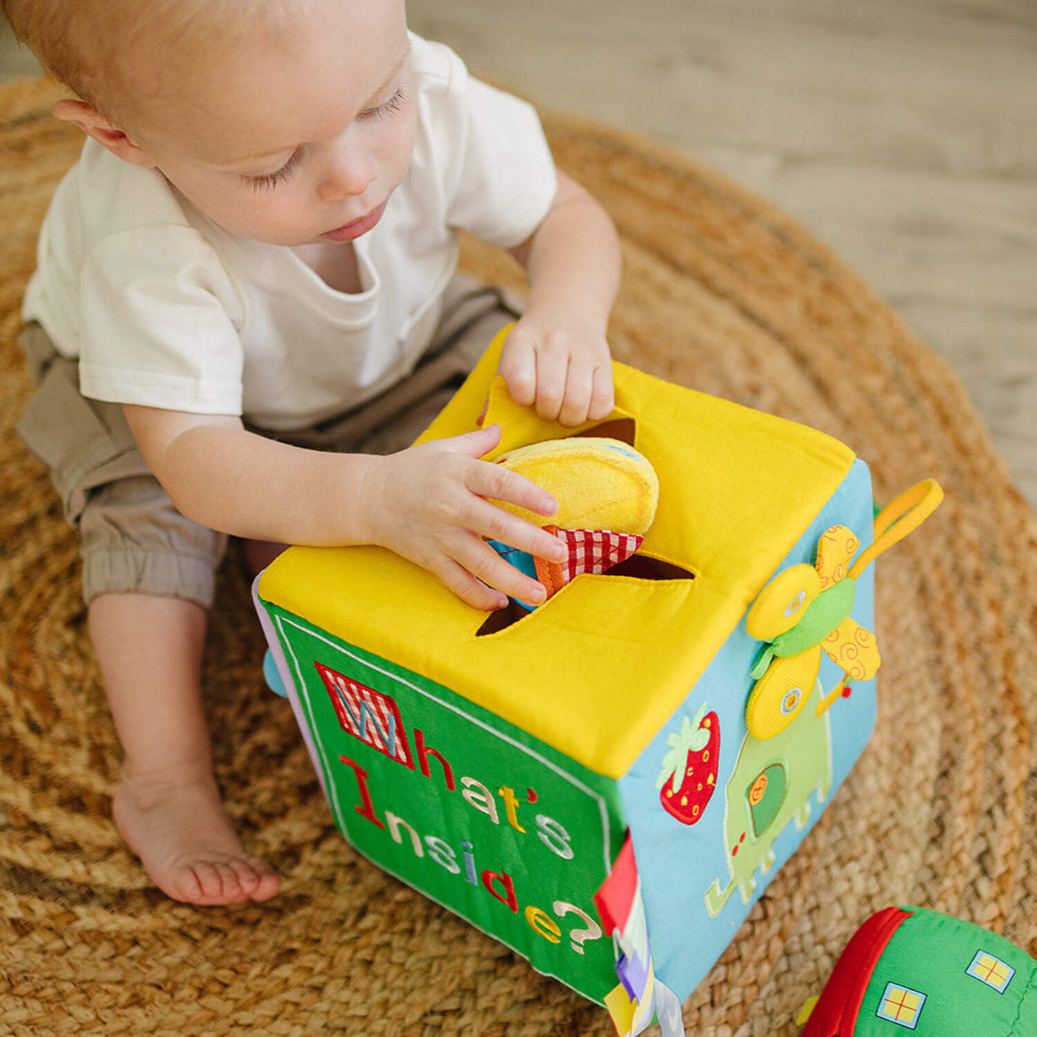 Genius Babies Baby Surprise Box with 8 Colorful Octopus Sensory Toys (7" x 7" x 7")