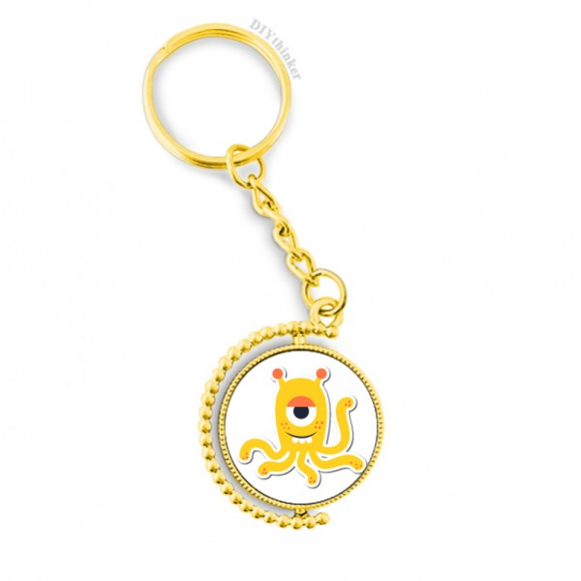 Universo y Alien monstruo amarillo Anillo de oro de metal llavero llavero