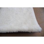 Faux cow rug