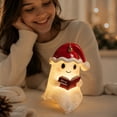thumbnail image 4 of MYUNNIL Christmas Ghost Reading Book Lamp, 5.5" Cute Light up Warm LED Santa Hat Ghost Resin Statue Night Light for Mantel Bedroom Home Decor & Gift, 4 of 5