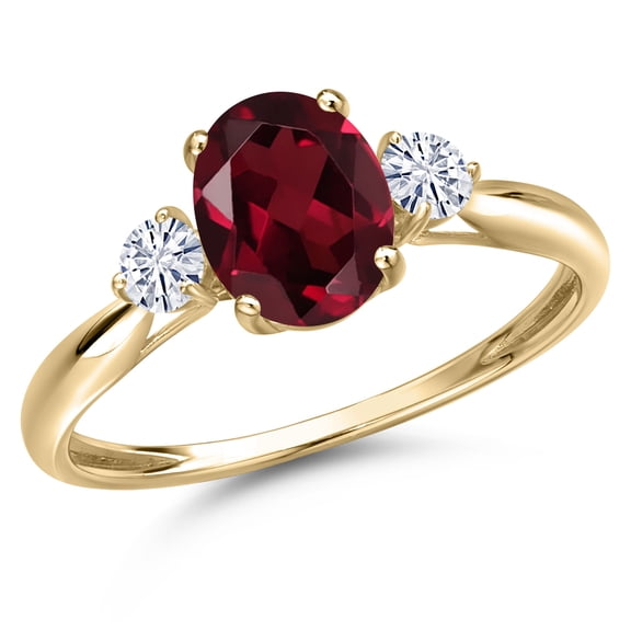 Gem Stone King 10K Yellow Gold Red Rhodolite Garnet and White Moissanite 3-Stone Ring for Women | 1.55 Cttw | Oval 8X6MM | Gemstone January Birthstone | Size 7