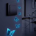 thumbnail image 1 of Pegatinas de interruptor de mariposa pequeñas luminosas azules, pegatinas de decoración para interruptor de dormitorio y sala de estar, 6 uds., 1 of 5