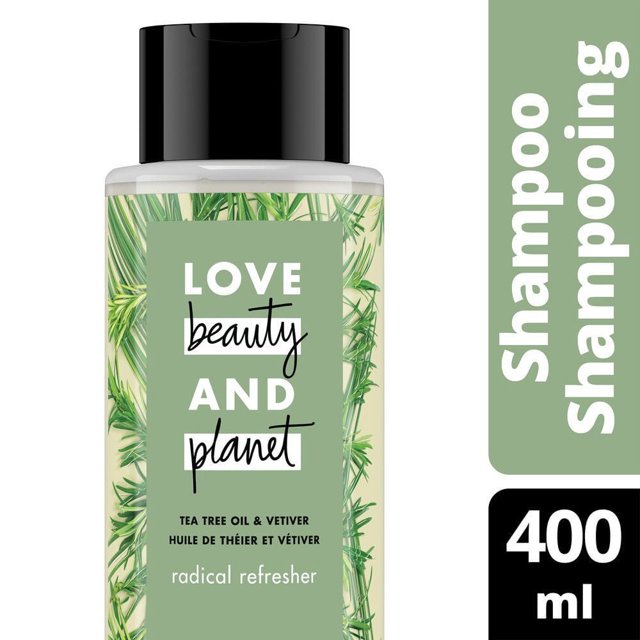 Love Beauty and Planet Tea Tree Oil & Vetiver Shampoo in a 400 ml white bottle with black flip cap and green label featuring tea tree and vetiver plant illustrations, formulated as a radical refresher shampoo for hydrating and volumizing hair.