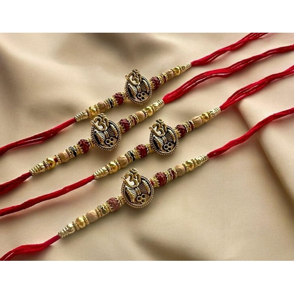 Spiritual Om & Damru Rakhi – Handcrafted Red Thread Rakhi for Raksha Bandhan 2025