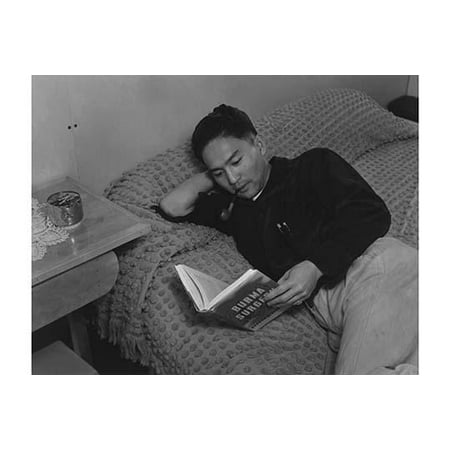 Dennis Shimizu half-length portrait lying on bed reading  Ansel Easton Adams was an American photographer best known for his black-and-white photographs of the American West  During part of his
