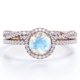 thumbnail image 1 of JeenMata Anillo Nupcial con Diseño Infinito de Pavé de Moissanita y Piedra Lunar Azul de Talla Brillante Redonda de 1,75 Quilates con Engaste de Halo de Cuatro Puntas Engastado en Plata, 1 of 6