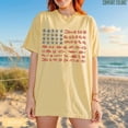 thumbnail image 2 of VibeNest Studio Unisex Seashell American Flag Coastal Nautical 4th of July Garment Dyed Graphic T-Shirt, 2 of 7