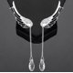 thumbnail image 1 of Pendientes de moda con forma de alas de ángel, con clip para la oreja, cadena de cristal, borla, joyería para la oreja, opción de regalo, material incrustado, uso versátil, 1 of 4