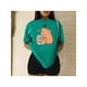thumbnail image 1 of Playera Blusa Divertida De Capybara Tomando Jugo Ropa De Mujer Capibara Color Verde Talla Grande Marca Emil SaEs, 1 of 4