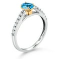 thumbnail image 3 of Gem Stone King 925 Sterling Silver and 10K Yellow Gold Swiss Blue Topaz and White Lab Grown Diamond Engagement Ring for Women (0.73 Cttw, Oval 6X4MM, Gemstone November Birthstone, Size 9), 3 of 4