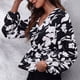 thumbnail image 2 of Blusa cruzada con escote en V, mangas farol y dobladillo con volados en color negro y flores blancas - Talla L Floral Chic, 2 of 6
