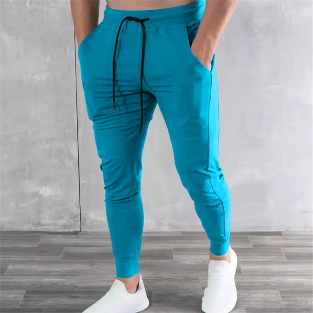 Pantalones deportivos de moda para hombre, con cordón ajustable y múltiples bolsillos, de poliéster y elastano.