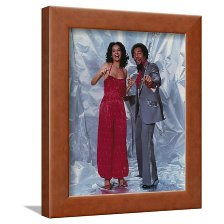 Marilyn McCoo standing in Dress With Man Framed Print Wall Art By Movie Star