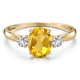 thumbnail image 3 of Gem Stone King 10K Yellow Gold Yellow Citrine and White Created Sapphire 3-Stone Ring for Women | 1.56 Cttw | Oval 8X6MM | Gemstone November Birthstone | Size 8, 3 of 6