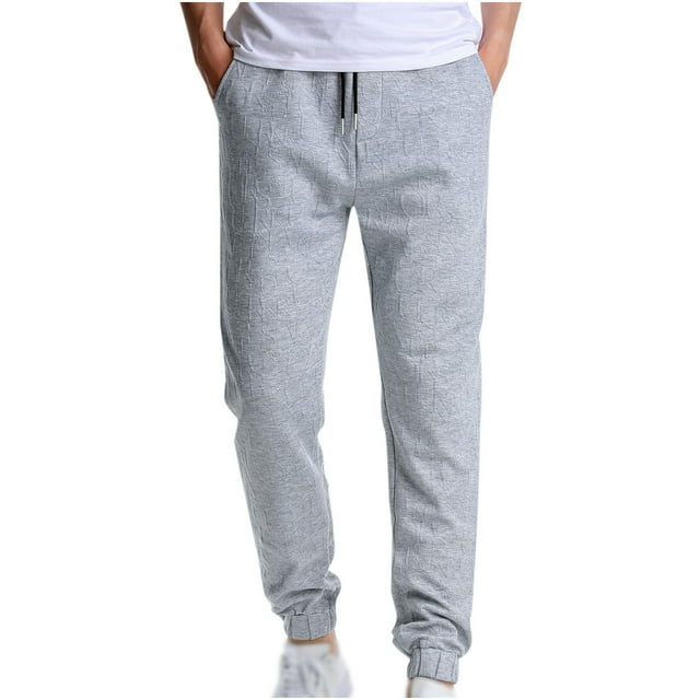 Los hombres y las mujeres pueden usar pantalones de jogging con cordón de color sólido Fridja hfkajh100591