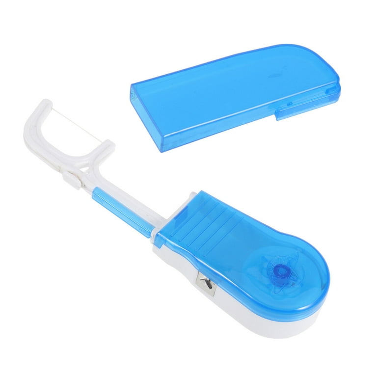 hands holding dental floss container - Emerson Dental