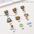 thumbnail image 4 of Nuevos accesorios para decoración de uñas con dibujos animados de Hello Kitty de piel negra, anillo de natación azul, lazo de gato KT, accesorios de armadura hechos a mano, 4 of 5
