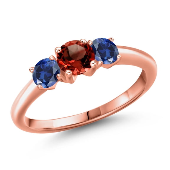 Gem Stone King 18K Rose Gold Plated Silver Red Garnet and Blue Created Sapphire Engagement Ring for Women | 1.05 Cttw | Round 5MM | Gemstone January Birthstone | Size 7