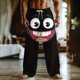 thumbnail image 1 of Ceisia Men's Fun Cartoon Big Smile Print Loose Casual Pants with Elastic Drawstring Waist Black M Gifts, 1 of 3