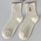 thumbnail image 1 of Calcetines de mujer de moda otoño e invierno nuevos calcetines de algodón lindos de estilo japonés de tubo medio calcetines de conejo bordados de tiras finas de color sólido, 1 of 6
