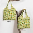 thumbnail image 3 of Xecao's Cute Dinosaurs Canvas Tote Bag is a versatile choice for women, serving as a stylish beach bag, shopping bag,and reusable grocery bag., 3 of 5
