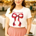 thumbnail image 5 of Merry Christmas Red Coquette Bow T‑Shirt, Minimalist Holiday Ribbon Tee for Festive Season, 5 of 5