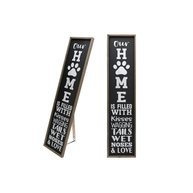 Floor standing framed wall sign with black background and white text saying 'Our Home is filled with kisses, wagging tails, wet noses & love' including a paw print symbolizing pet-friendly home.