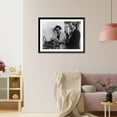thumbnail image 3 of Historic Framed Print, [Hannah Arendt, half-length portrait, standing, facing left; looking at paper with reporter], 17-7/8" x 21-7/8", 3 of 9