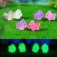 thumbnail image 1 of Minifiguras luminosas de dinosaurios para decoración del hogar, accesorios de jardín de hadas, miniaturas para escritorio, 10/20/50 piezas, 1 of 3