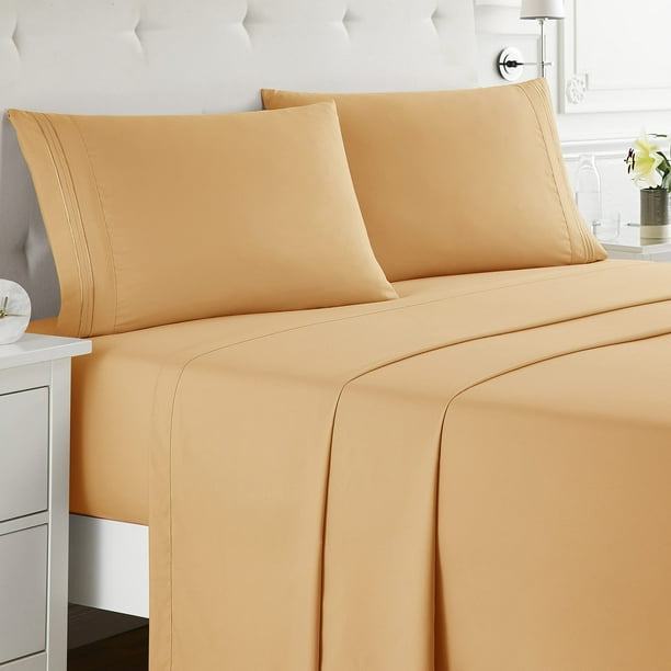Orange sheets and shop pillowcases