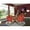 Mahogany, variant on ANAB5-MAH-72 5Pc Round 36" Table And 4 Parson Chair With Mahogany Leg And Pu Leather Color Firebrick Red
