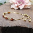 thumbnail image 4 of 18K Yellow Gold Plated Silver Simulated Red Garnet & White Natural Diamond Gemstone Birthstone Tennis Bolo Adjustable Bracelet For Women (6.37 Cttw, Oval Fully Adjustable Up to 9 Inch), 4 of 7