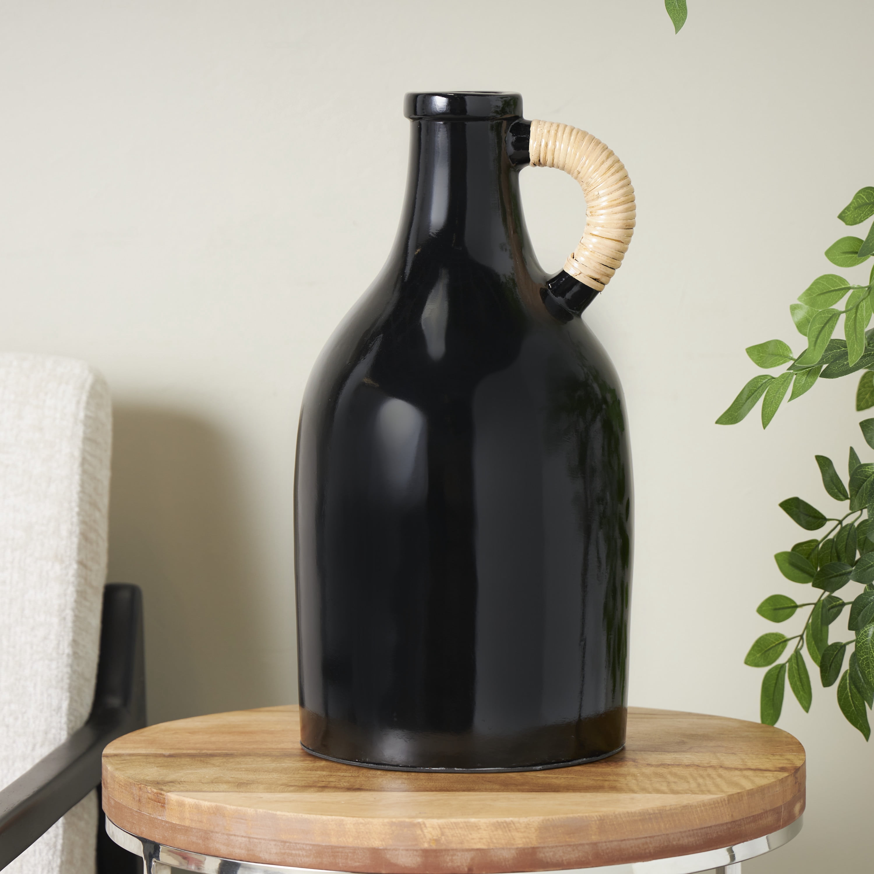 DecMode 18" Jug Inspired Black Ceramic Vase with Rattan Wrapped Handle