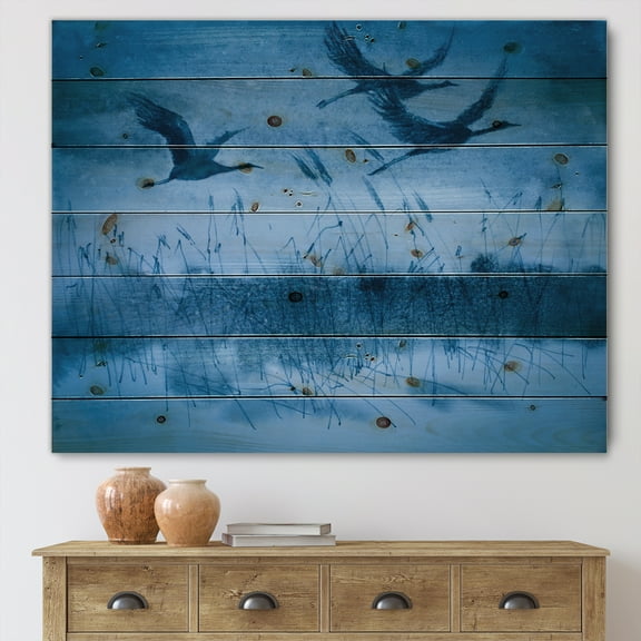 Designart 'Cranes In Flight During Blue Evening Light' Traditional Print on Natural Pine Wood