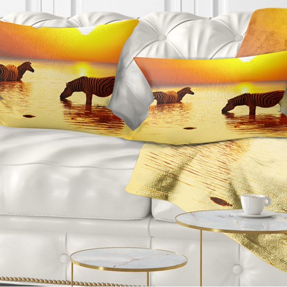 Designart Zebras Drinking in Lake at Sunset - Animals Throw Pillow - 12x20