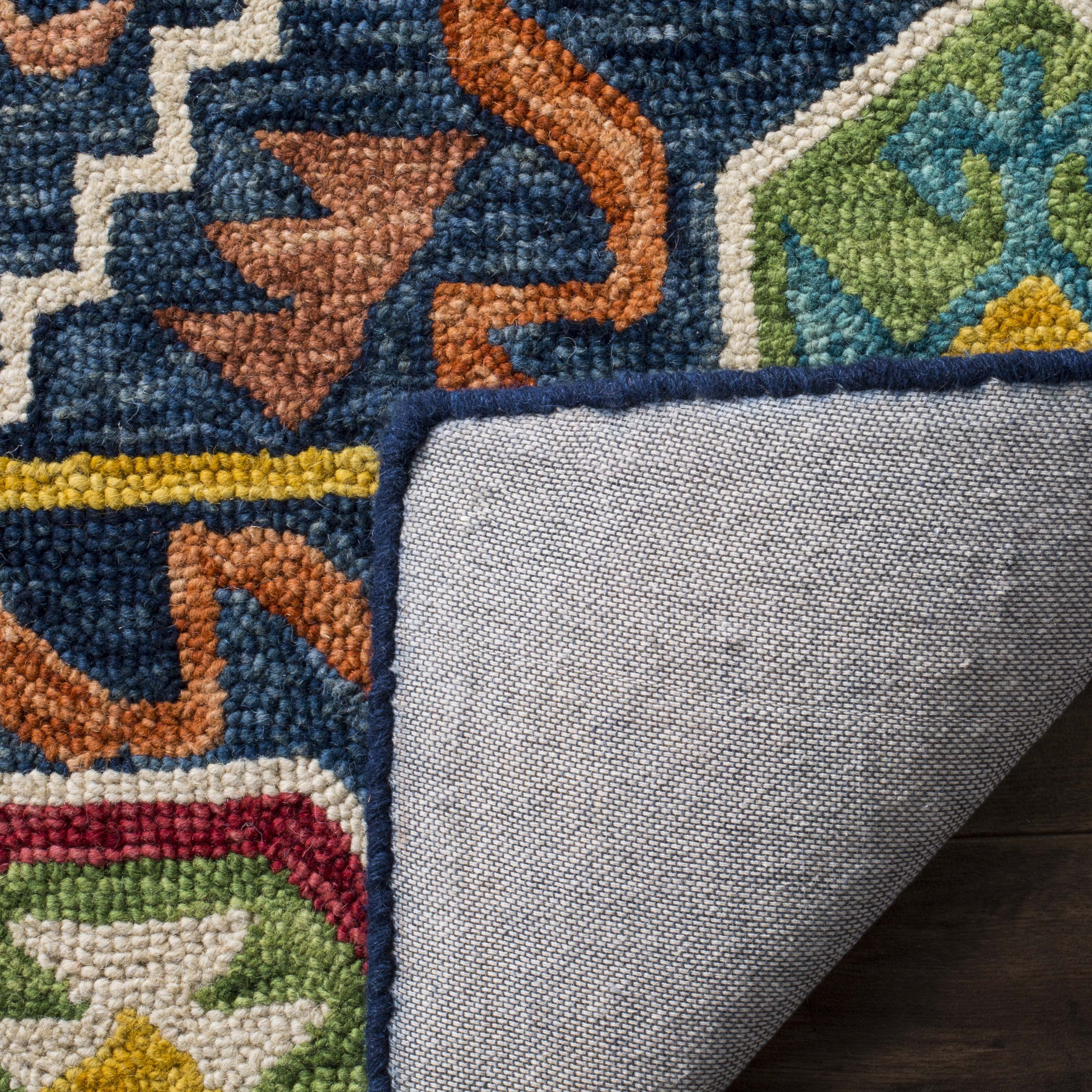 SAFAVIEH Aspen Joyce Southwestern Wool Area Rug, Navy/Gold, 4' x 6'