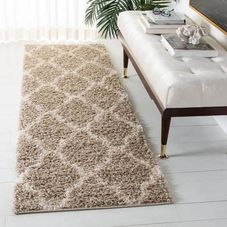 Safavieh Dallas Shag Hacer Trellis 1.5-inch Thick Rug Beige/Ivory 2 3  X 12  Runner Latex Free More than 1 inch 12  Runner Runner  Indoor Entryway SAFAVIEH Dallas Shag SGDS257D Beige / Ivory Rug Inspired by classic shag rugs in European homes  SAFAVIEH s Dallas Shag Collection is a stylish transitional floor covering that blends chic modern design with expert construction. Boasting a 2-inch pile height  this rug provides sink-in comfort underfoot while imbuing a sense of sumptuous relaxation. Rug has an approximate thickness of 1.5 inches. For over 100 years  SAFAVIEH has set the standard for finely crafted rugs and home furnishings. From coveted fresh and trendy designs to timeless heirloom-quality pieces  expressing your unique personal style has never been easier. Begin your rug  furniture  lighting  outdoor  and home decor search and discover over 100 000 SAFAVIEH products today.