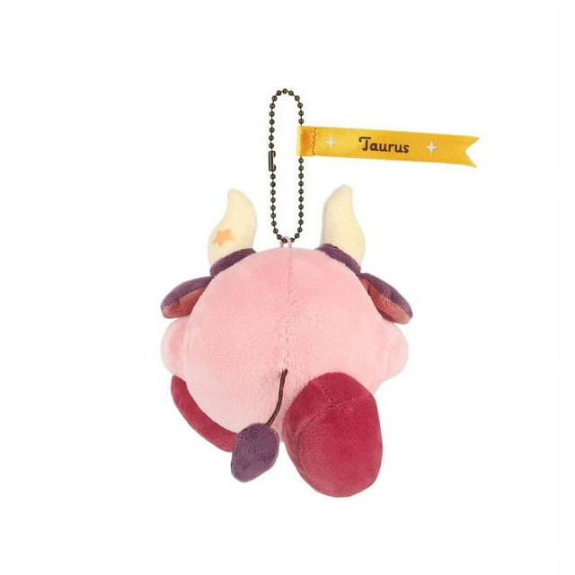 san-ei ea-hc02 kirby kirby horoscope collection mascot, taurus, plush toy, height 5.1 inches (13 cm) Peluche llavero Kirby visto desde atrás en 3/4 con vincha de cuernos, cola corta y cadena de bolitas metálica; etiqueta amarilla con la palabra "Taurus"; tamaño aproximado 13 cm.