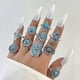 thumbnail image 3 of Anillo de imitación de turquesa de estilo retro europeo y americano con diseño de flores y hojas, anillo geométrico articulado con águila, traje para mujer, 3 of 6