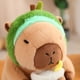 thumbnail image 4 of Peluche de capibara kawaii, adorable capibara que se convierte en dinosaurio, conejo, unicornio, muñeco de peluche, almohada de animal de dibujos animados suave, regalo para niñas y niños, 4 of 5